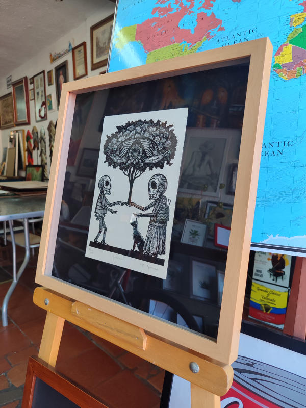 Xilografía calaveras y árbol